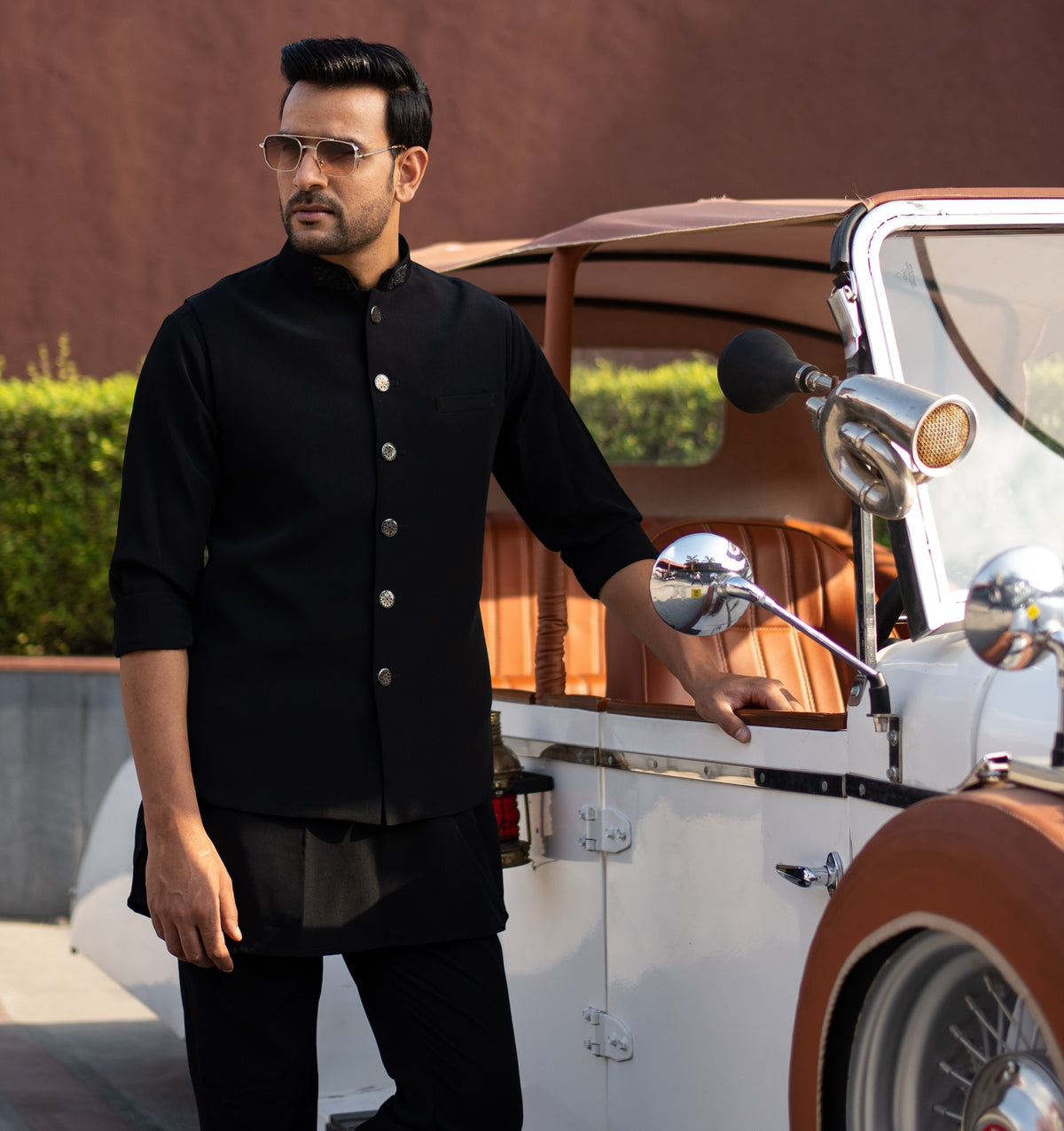 Man in a tailored black bandhgala